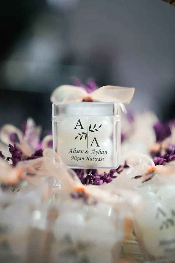 Cute Wedding Idea. Wedding favors candles with bride and groom's names and the wedding date