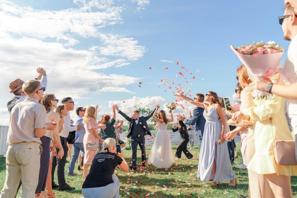 flower petals tossed on the bride and groom after the ceremony flower petals tossed on the bride and groom