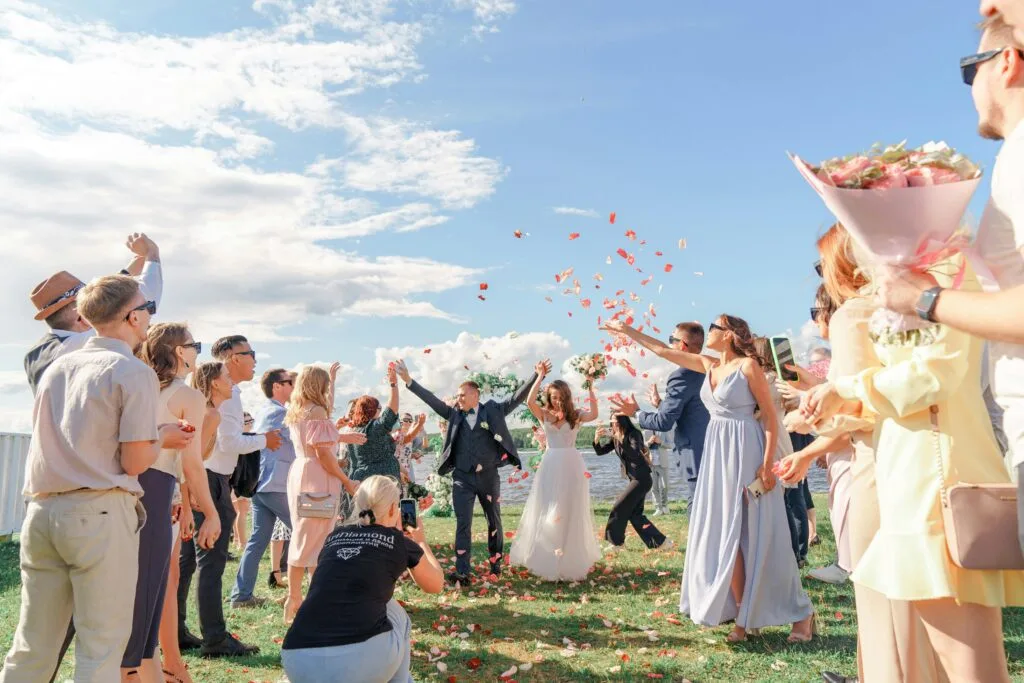 flower petals tossed on the bride and groom