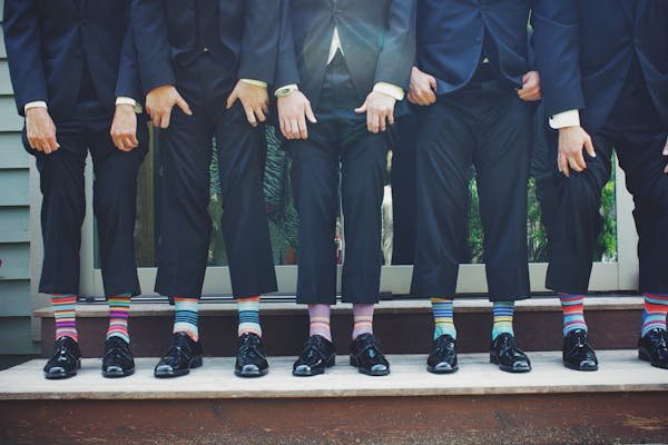wedding party wearing fun socks