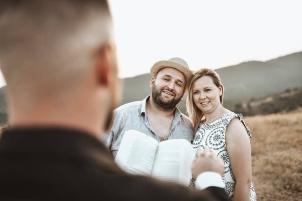 couple rehearsing wedding ceremony