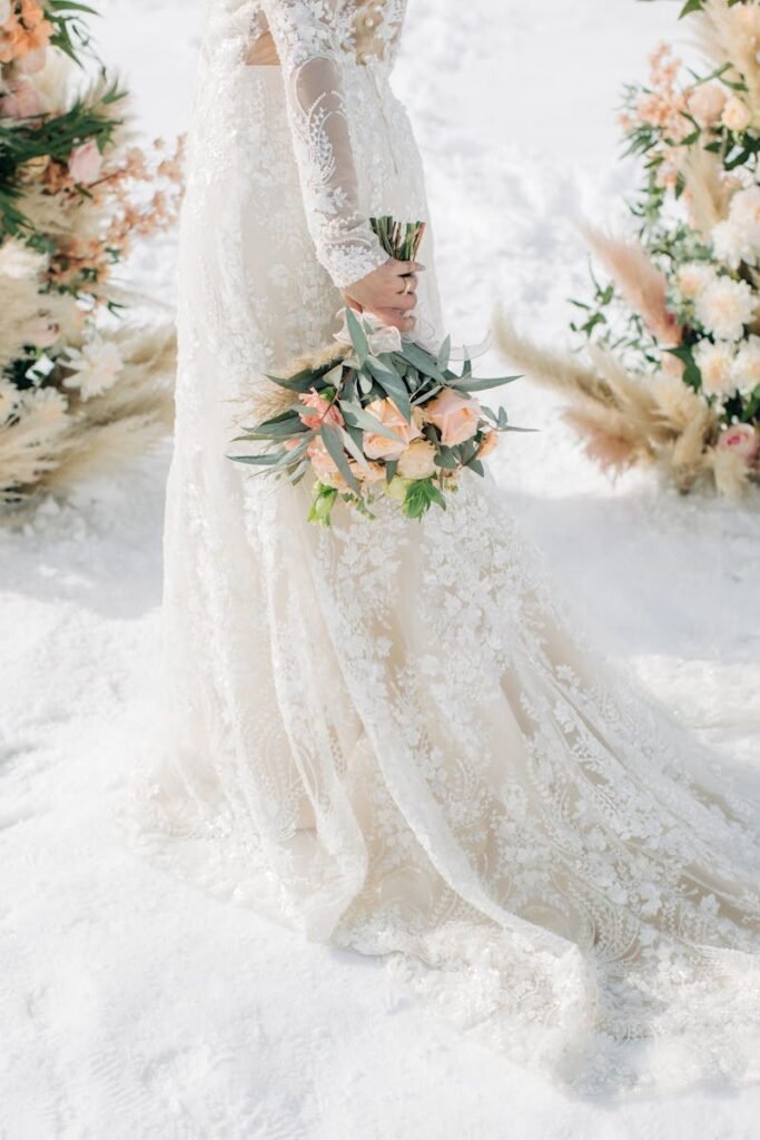 bride in the snow at her winter wedding