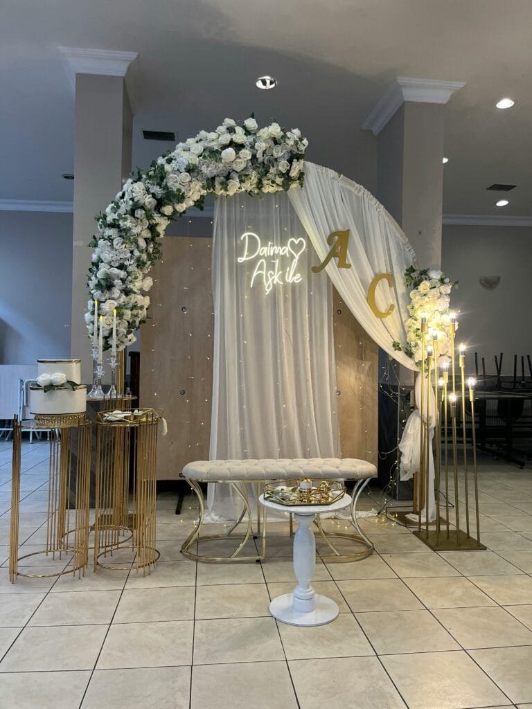 Wedding arch doubles as a photo backdrop
