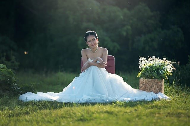 wedding under $10,000, bride sits alone