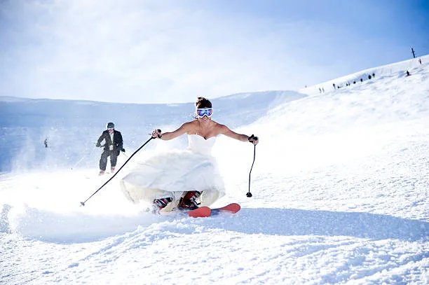 How to plan a destination wedding, bride skiing