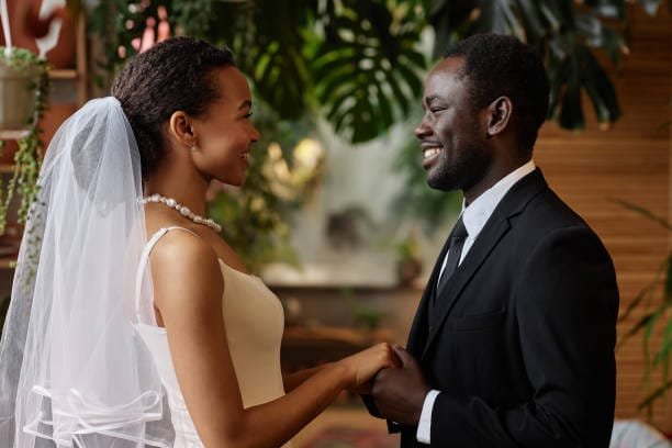 couples exchanging wedding vows