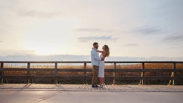 Wedding ceremony rehearsal bride and groom sunset