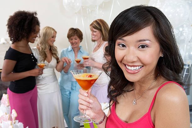 Bride enjoying a cocktail at her bridal shower