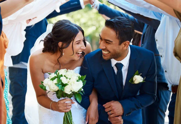 Bride and groom laughing after exchanging vows